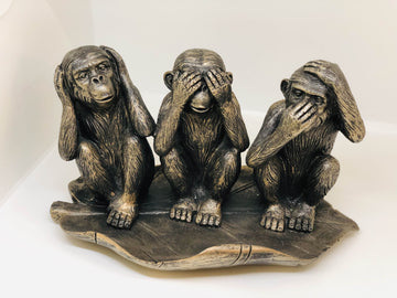 Three Monkeys On Leaf